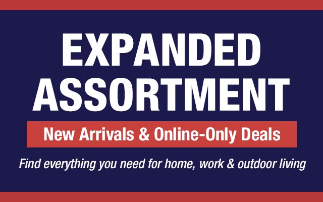 Adult and child smiling at laptop