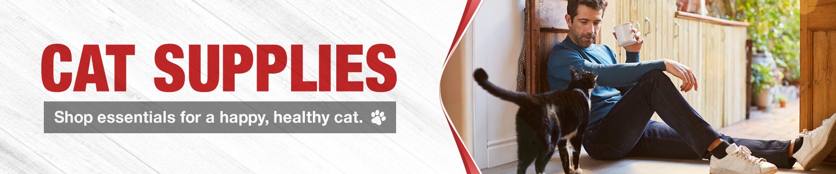 Man relaxing on floor with cat