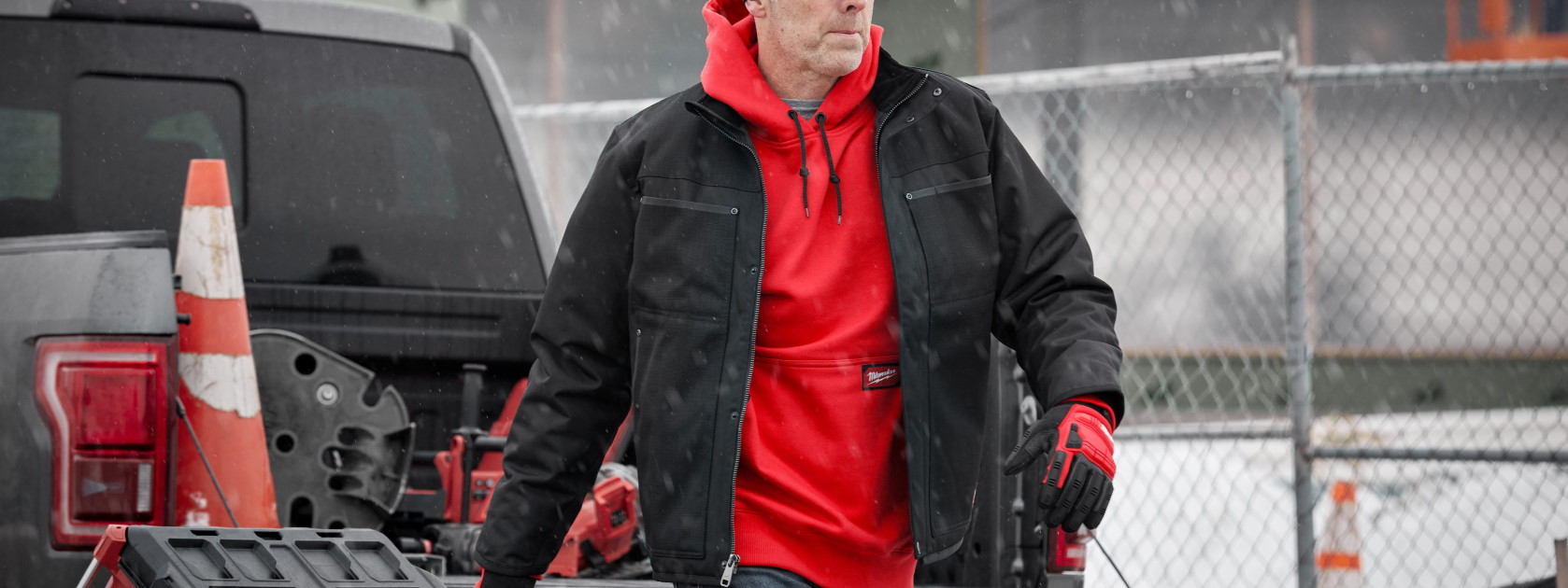 Construction Worker wearing Milwaukee pullover hoodie